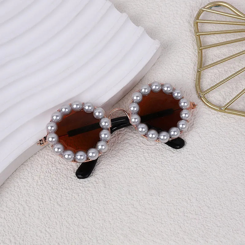 Pearl-trimmed round sunglasses for cats and dogs in five colour options