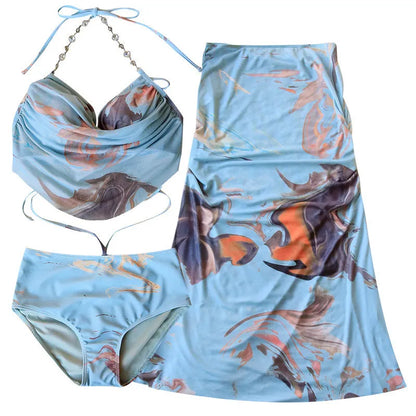 Women's blue printed triangle bikini set with skirt, showing steel support push-up top.