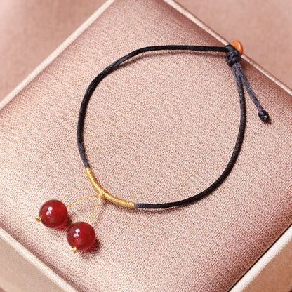 Hand-woven red agate bracelet and necklace set for women in national style with bead design.