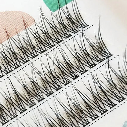 Black V-shaped fairy fishtail false eyelashes showing thick segment design with 8mm to 12mm length variations