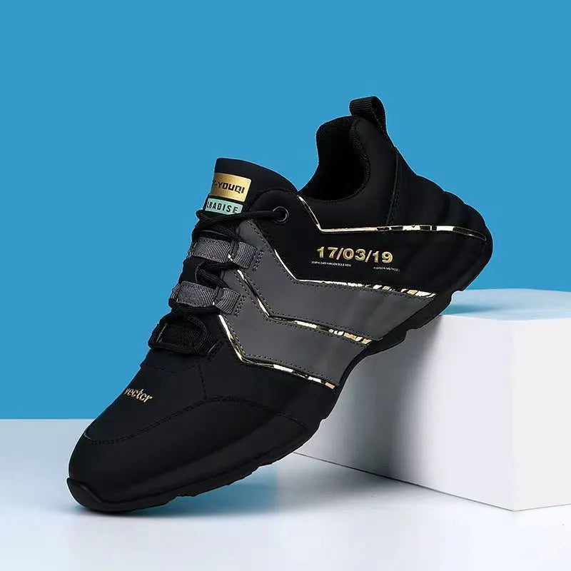 Pair of casual low-top lace-up sneakers with round toe and mesh lining on a plain background.