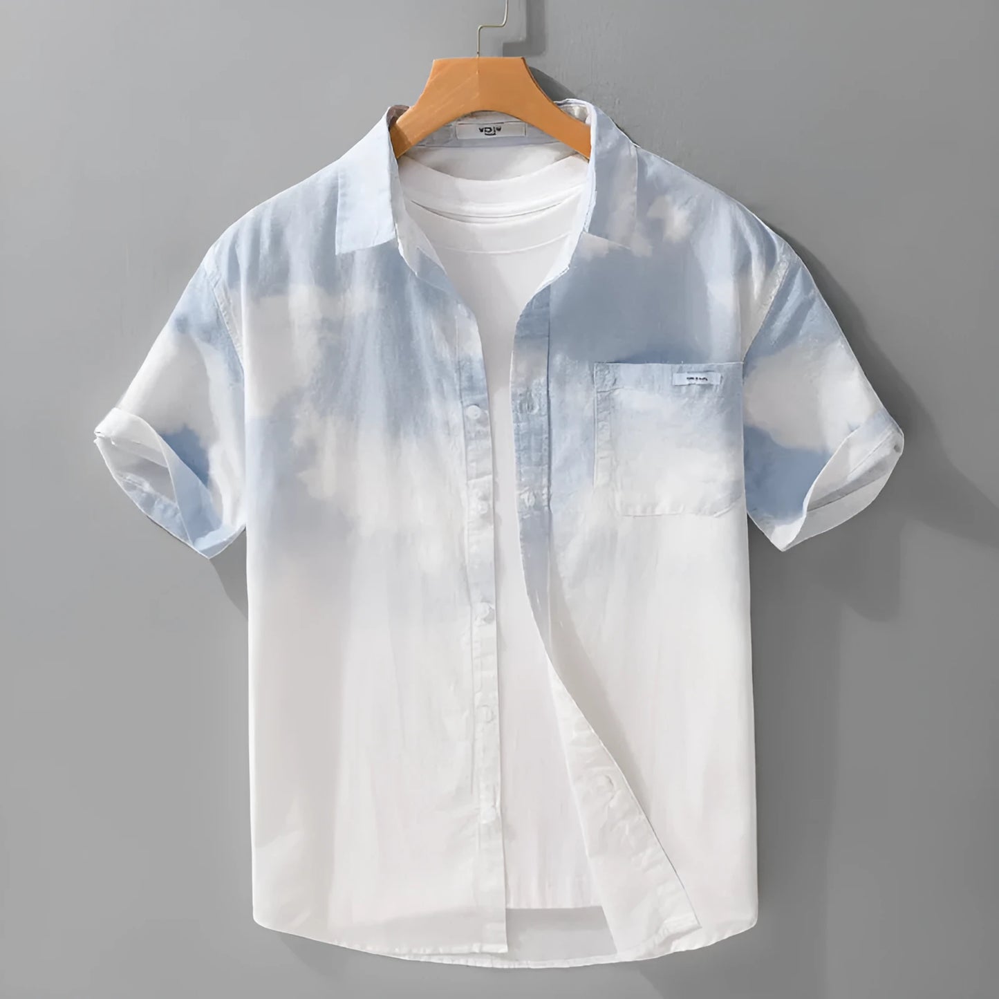 Man wearing a light pink loose-fit pure cotton short sleeve casual shirt.