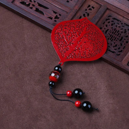 Brass metal bookmark with hollow plating leaf design and rose gold tassel decoration
