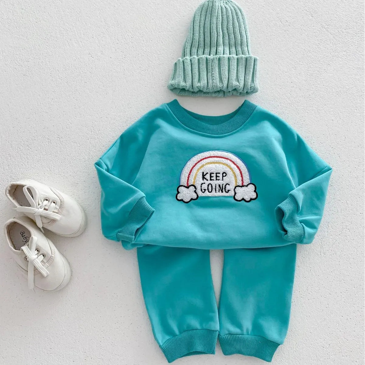 Children's cotton two-piece sweater set with pullover top and trousers in beige, emerald, or pink, sizes 66cm to 100cm.