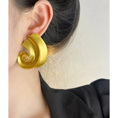Gold and silver retro geometric alloy ear studs on a white background.