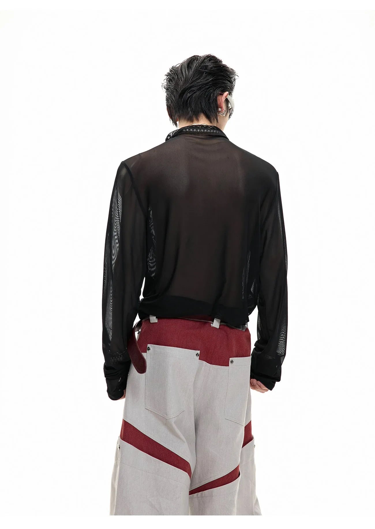 Black and white long sleeve slim fit mesh bottoming shirt laid flat.