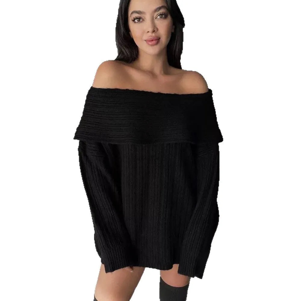 Woman wearing a loose white acrylic knit pullover sweater with long sleeves and an off-neck design.