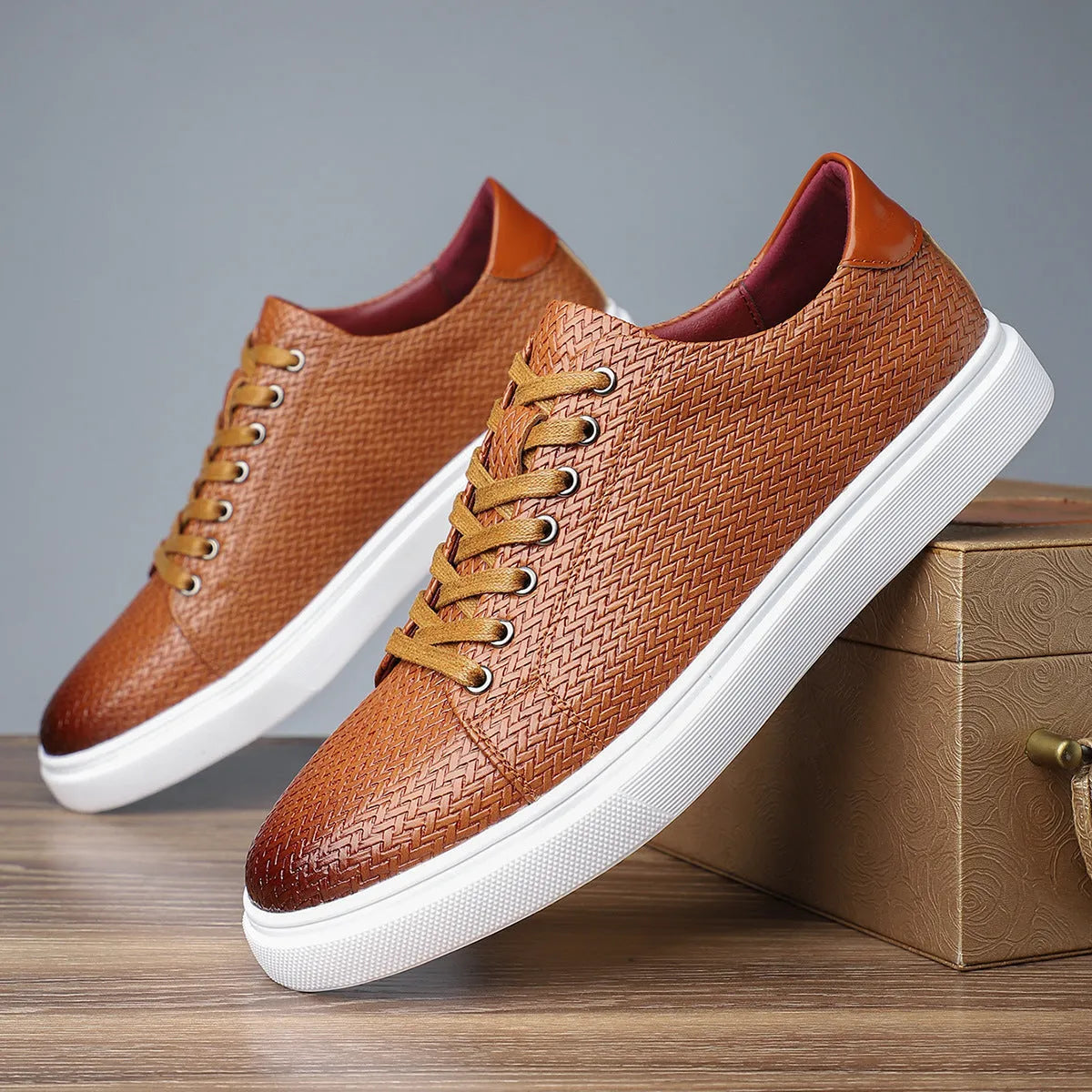 Men's black low-top business leather shoes with a leather toe cap and rubber sole