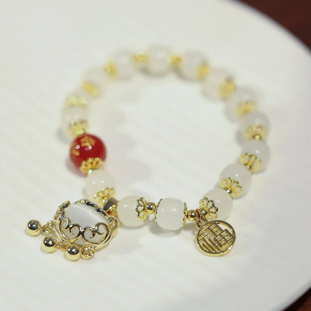 Women's Chinese-style glass bracelet with safety lock charm in choice of three colour options