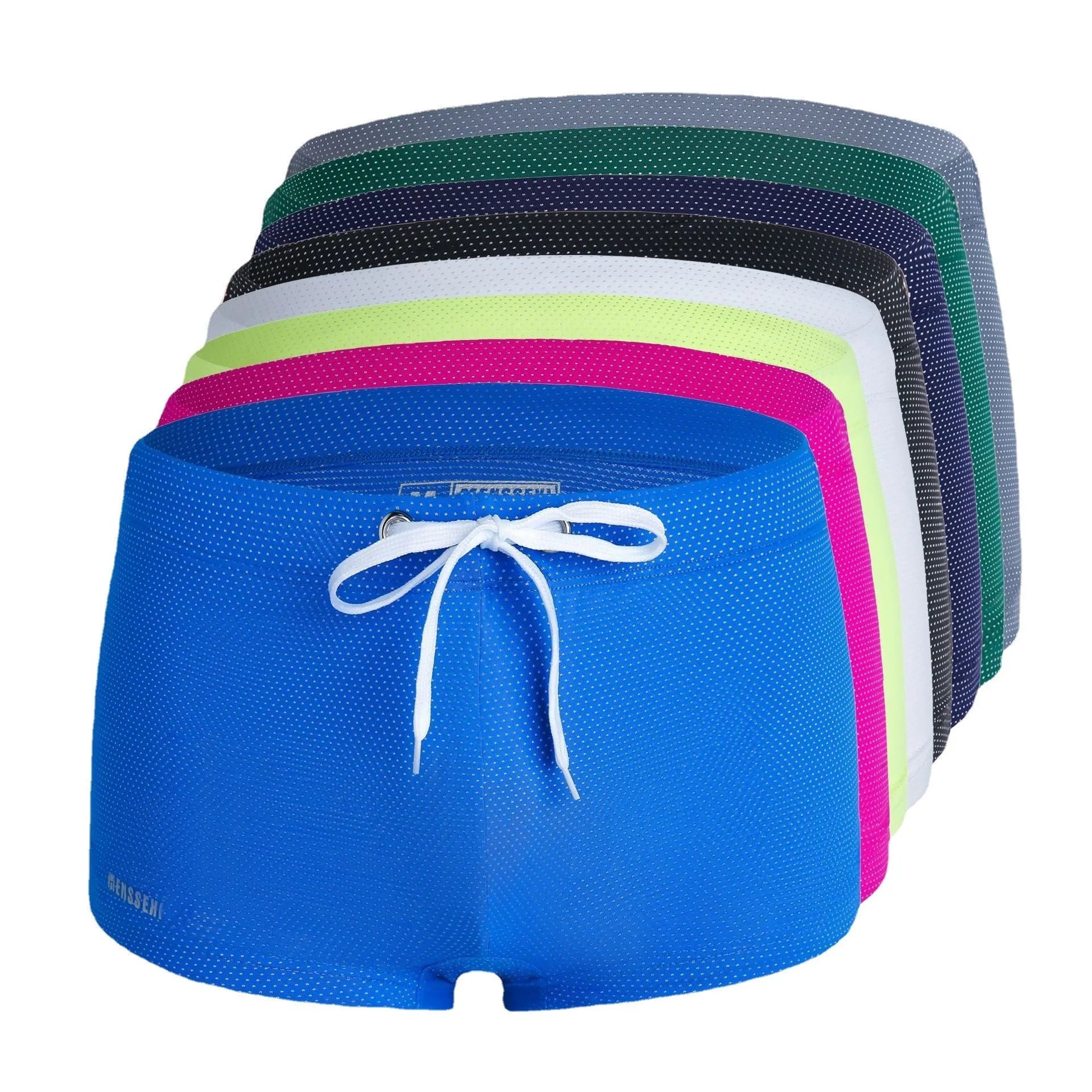 Men's low waist swim trunks in stretch nylon on a man, showing elastic waistband and boxer-style cut.