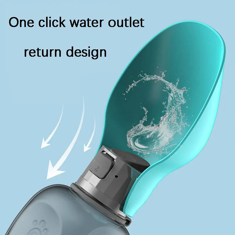 Blue grey portable dog water bottle with fold-out drinking bowl, shown with a wrist strap.