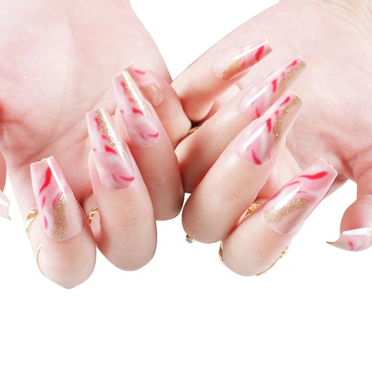 One Second Wearable Manicure set with 24 nail art pieces in rose, tulip, leopard print, and XINGX patterns