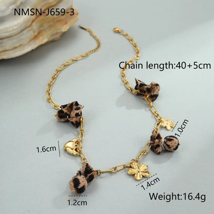 Women's adjustable stainless steel necklace with geometric leopard pendant featuring heart and flower decorative elements