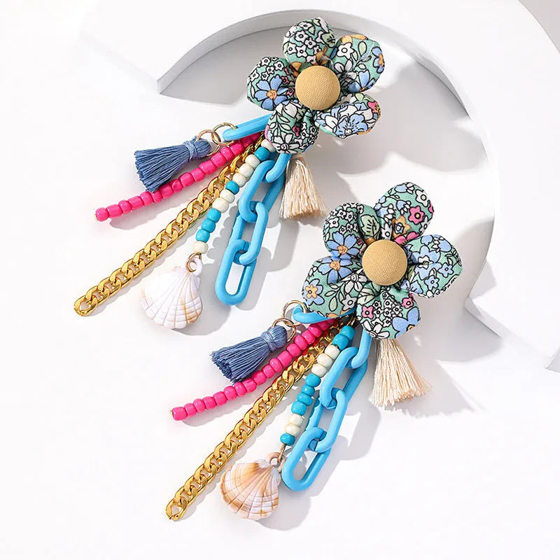 Handmade bohemian shell tassel earrings for women with colourful flower and geometric drop design