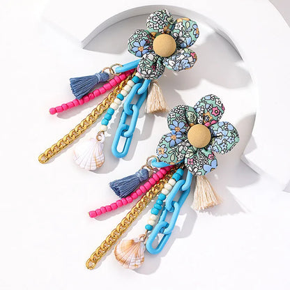 Handmade bohemian shell tassel earrings for women with colourful flower and geometric drop design