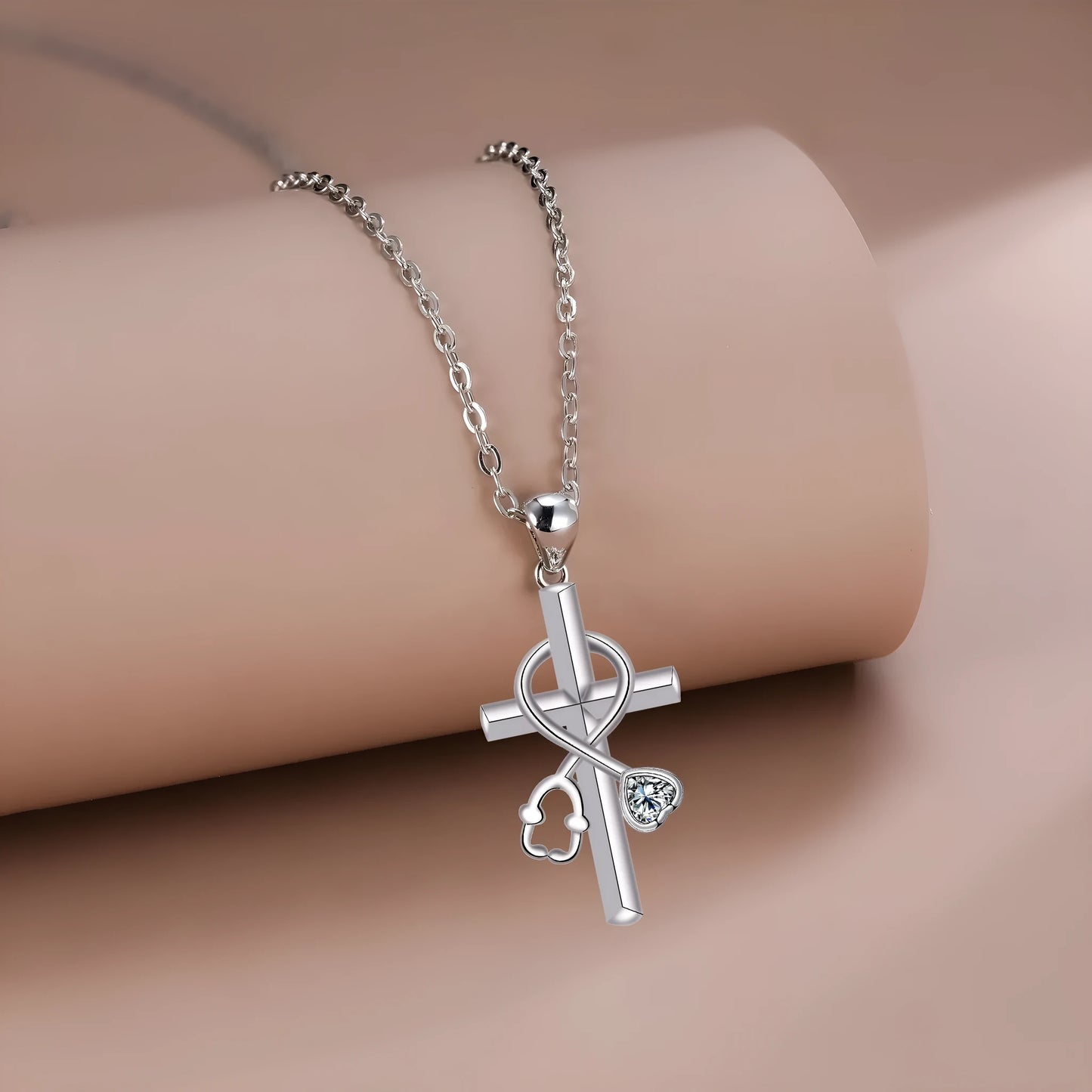 Medical-themed cross necklace with stethoscope pendant on copper chain