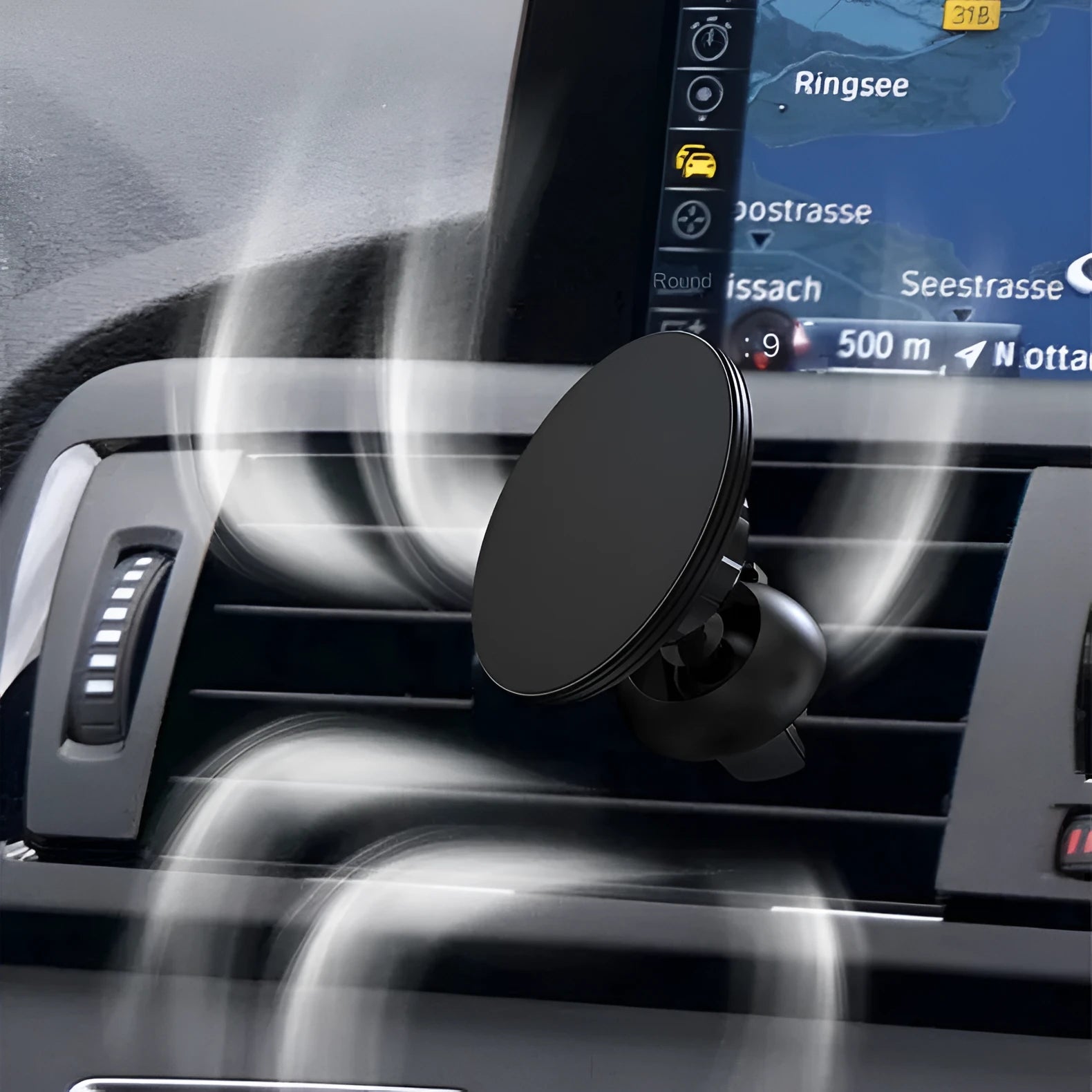 Black aluminium alloy magnetic phone holder attached to a car air vent, showing adjustable ball joint.
