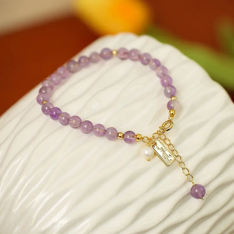Women's natural lavender amethyst crystal bracelet in elegant design on wrist