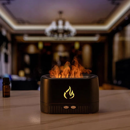 Black simulated flame aromatherapy humidifier with USB cable, water tank, and control buttons on a wooden surface.