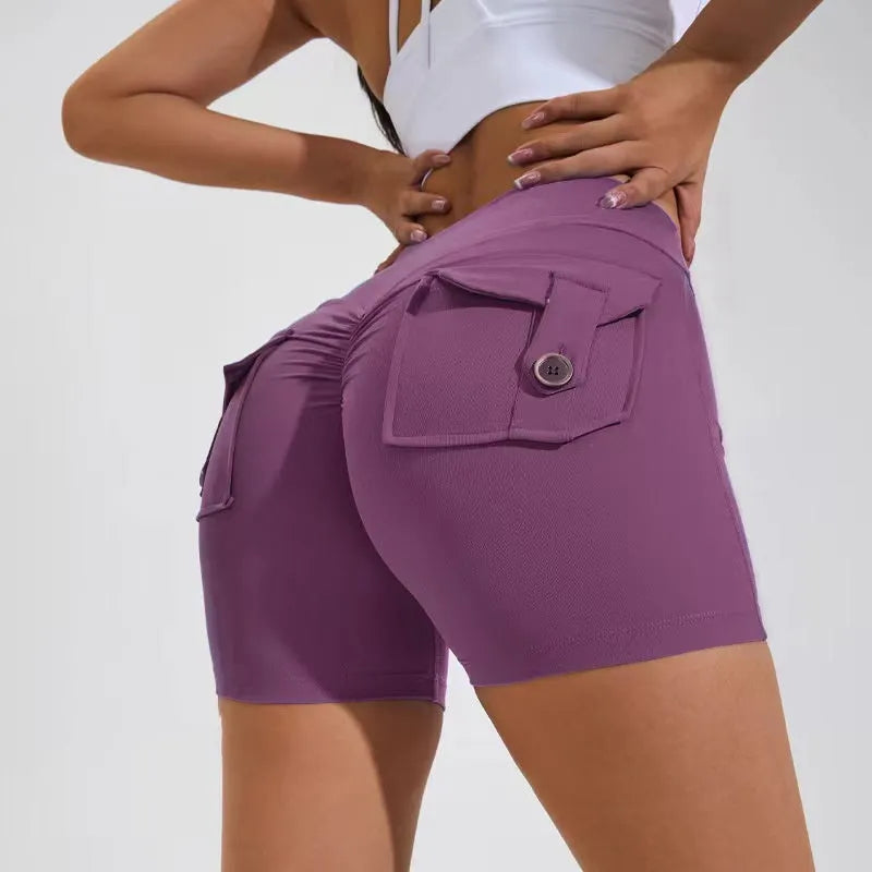 Women's high-waist quick-dry fitness shorts with side pockets in avocado green colour