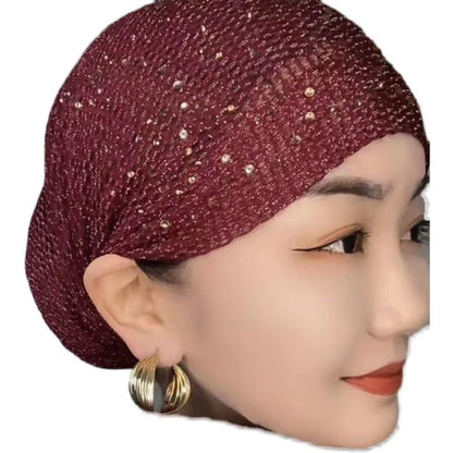 Stylish knitted beanie cap with hollow-out pattern in various colors, perfect for keeping warm and fashionable in the UK
