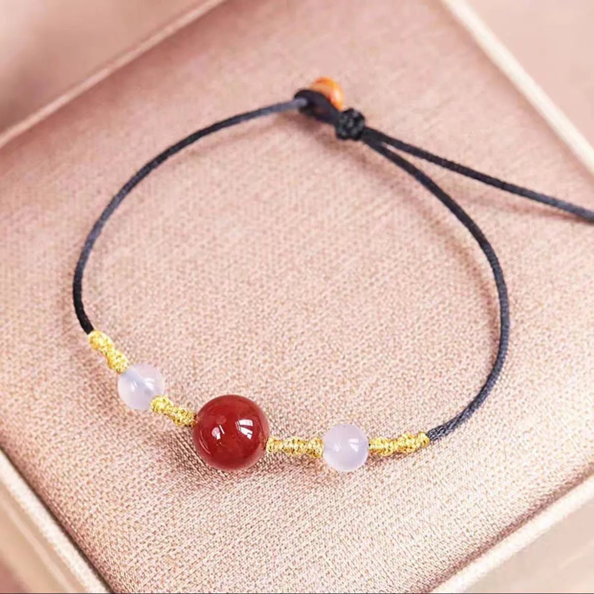 Hand-woven red agate bracelet and necklace set for women in national style with bead design.
