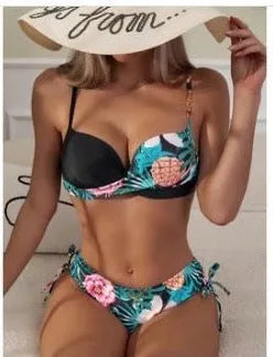 Women's printed two-piece bikini with push-up top and split hip briefs in various colours.