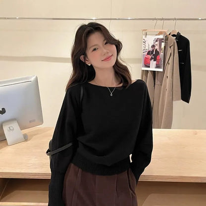 Women's long sleeve viscose pullover blouse in free size shown in one of seven colours.