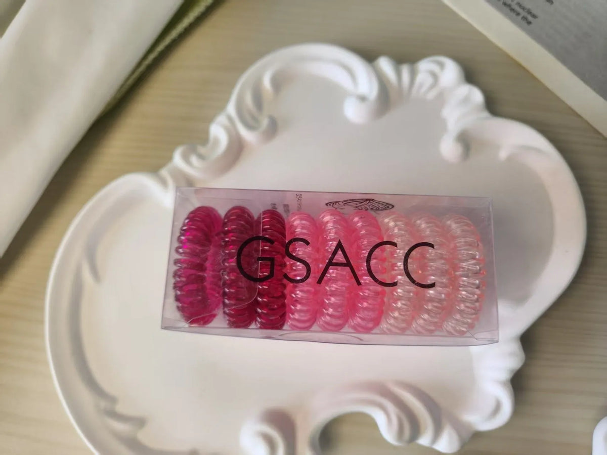 Set of 9 TPU traceless hairbands in various colours for phone cable organisation