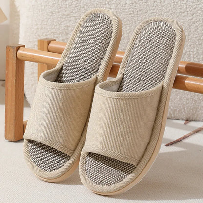 Women's open-toe linen slippers with thick sole in light brown colour.