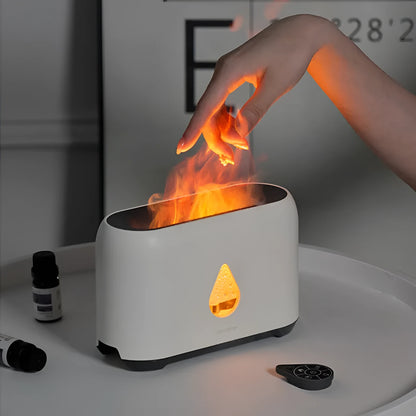Mini remote control flame diffuser air humidifier, round plastic USB unit with 2-8 hour timer, shown in white, pink, green or grey