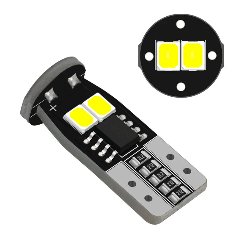 Small white LED car licence plate light with fibre glass board, shown at 10mm size.
