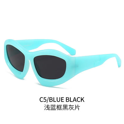 Outdoor unisex sunglasses with concave bubble lenses in black frame on a table.