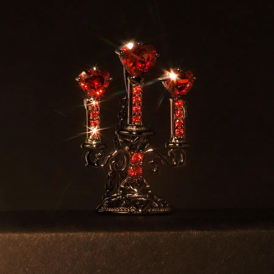 Women's zinc alloy Gothic clavicle chain with a hollow retro candlestick pendant on a cross link chain.
