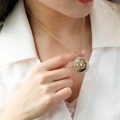 Exquisite Pegasus coin necklace and earrings set in an antique-inspired design, showcasing intricate relief carvings of the mythical winged horse from ancient Greek legend.
