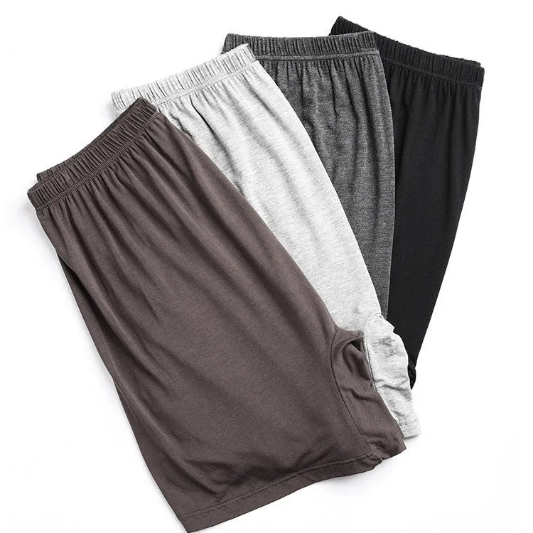 Men's solid colour high-waist boxers in modal fabric laid flat.