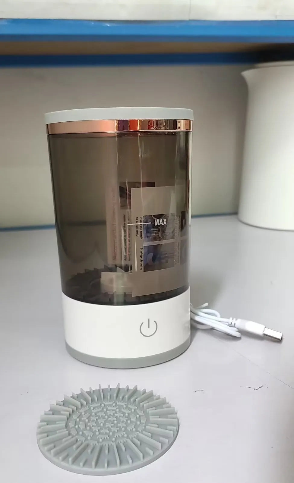 Grey and white portable electric makeup brush cleaner machine with USB charging cable