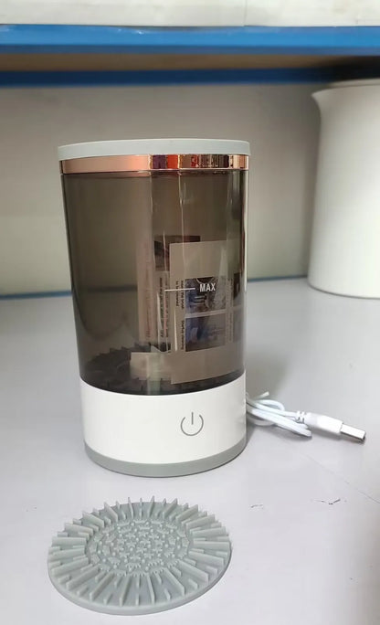 Grey and white portable electric makeup brush cleaner machine with USB charging cable