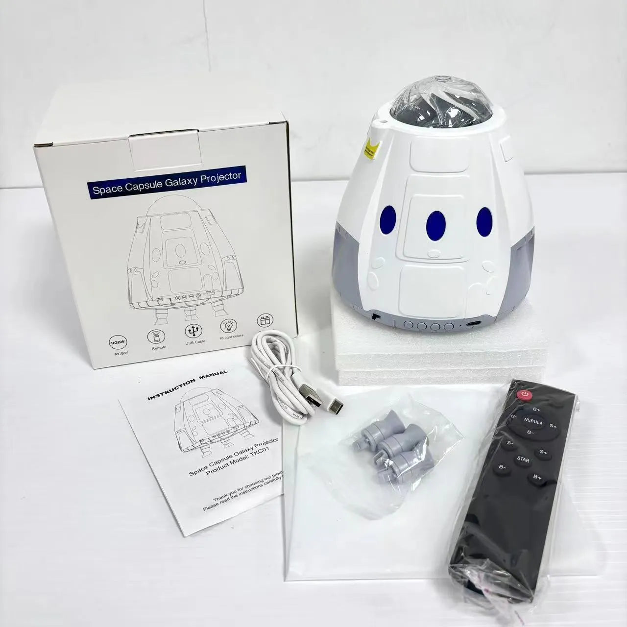 USB-powered starry atmosphere projection lamp in compact 14.5cm capsule design with remote control