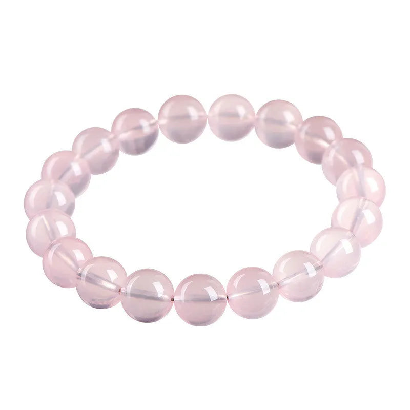Natural starlight crystal bracelet with polished pink beads in multiple size options