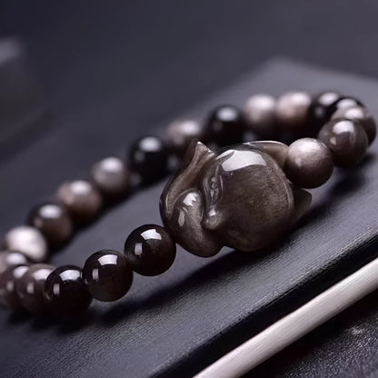 Obsidian bracelet with 8mm beads and single fox charm in Obsidian Fox colour
