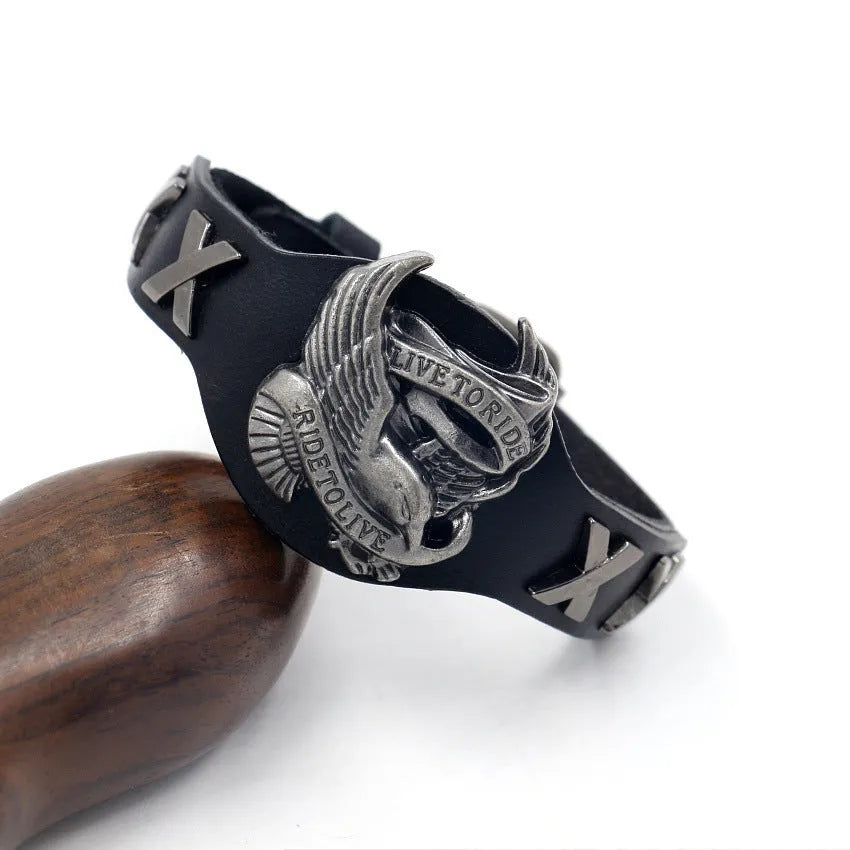 Black geometric leather bracelet with a detailed alloy eagle watch buckle closure.