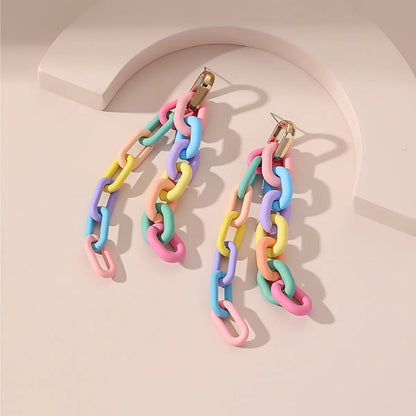 Handmade bohemian shell tassel earrings for women with colourful flower and geometric drop design
