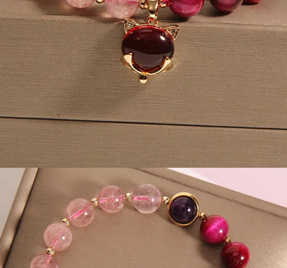 Women's elastic bracelet with strawberry crystal on a stretchy rope band.