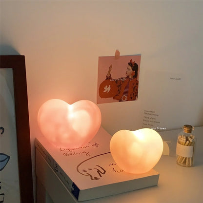 White and pink vinyl atmosphere lamps in trumpet and tuba shapes showing 8cm and 11cm size options