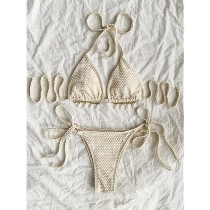 Women's halter lace-up bikini in polyester fabric with briefs style