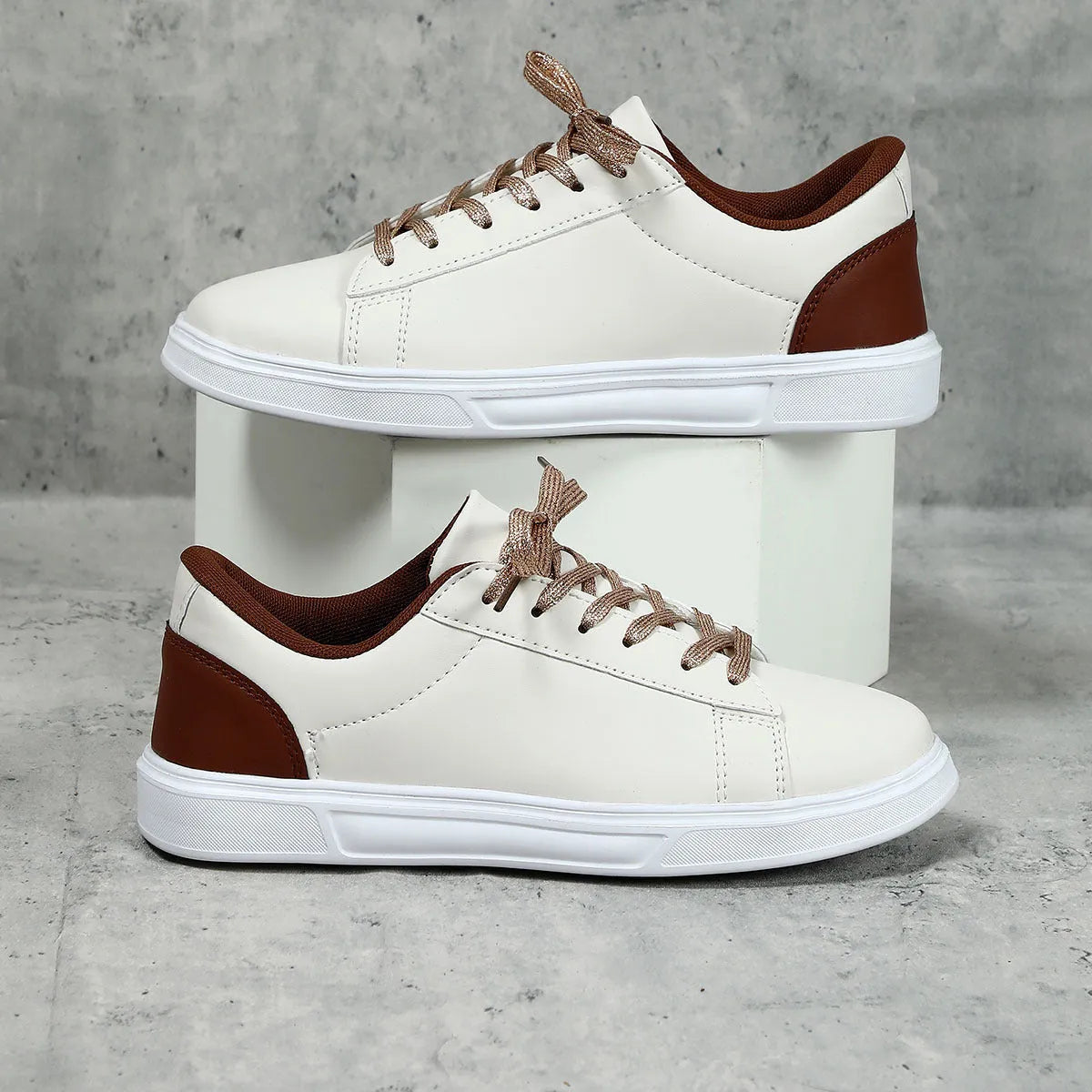 Casual beige brown platform skateboard sneakers with a low-top PU upper, round toe, and cross-strap detail