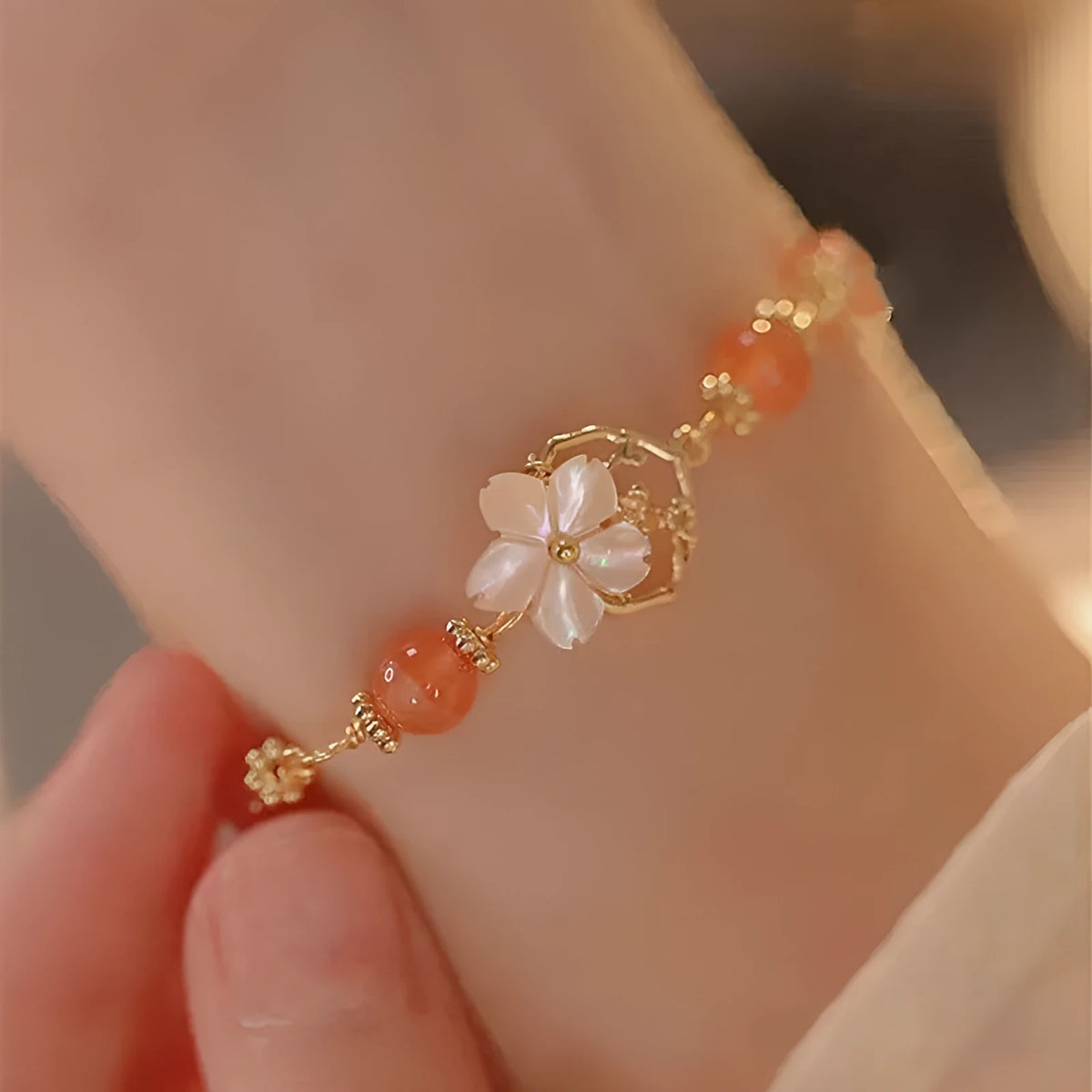Red gusset women's bracelet with star charm and adjustable clasp