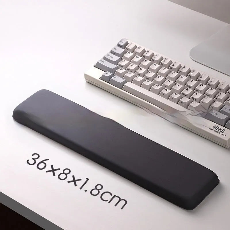 Square cloth-covered silica gel wrist rest mouse pad on a desk.