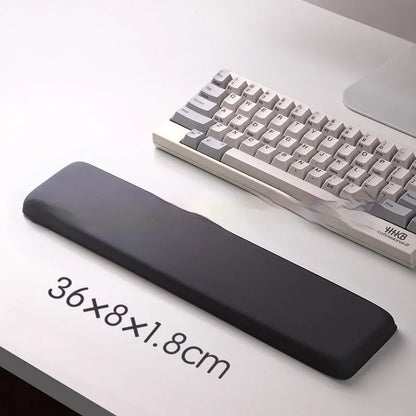 Square cloth-covered silica gel wrist rest mouse pad on a desk.